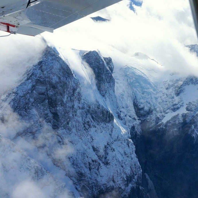 Snow capped mountains our aerial view to Milford Sound